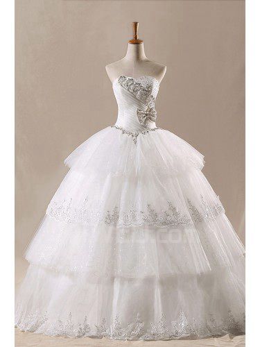 Boule étage longueur robe de mariée robe bustier net avec des fleurs à la main