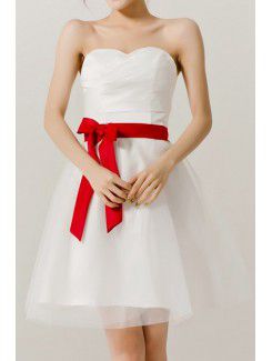 Organza sweetheart kort-line klänning med rosett